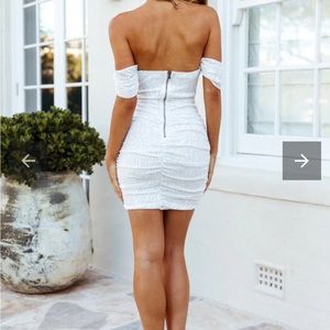 White sequin mini dress off the shoulder